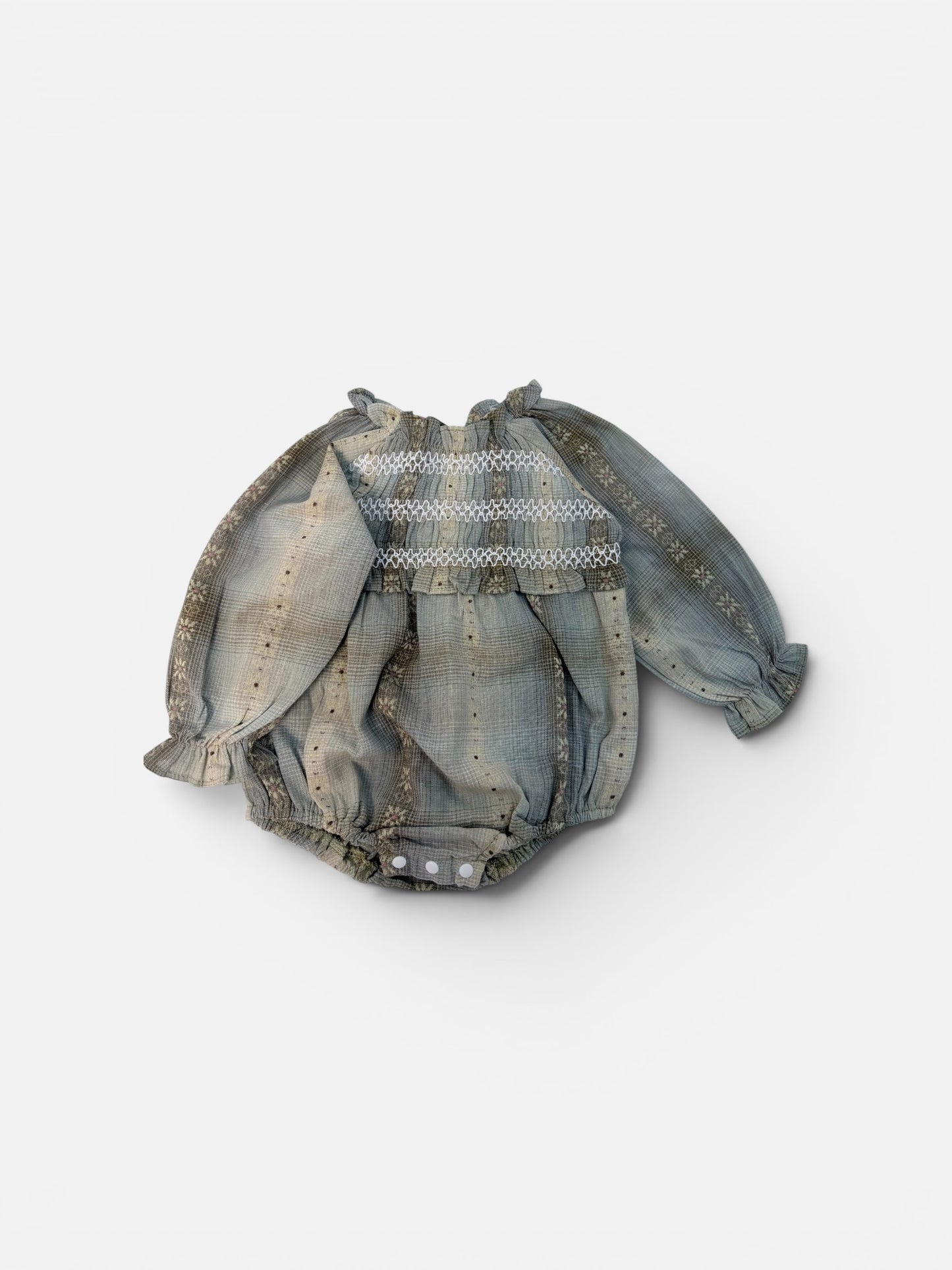 Pagliaccetto in cotone fantasia con smock e maniche lunghe – neonato/a cod#016